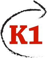 A red k 1 logo with an arrow in the background.